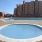 2 dormitorios, garaje y piscina