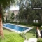 Con piscina, parque infantil y jardines